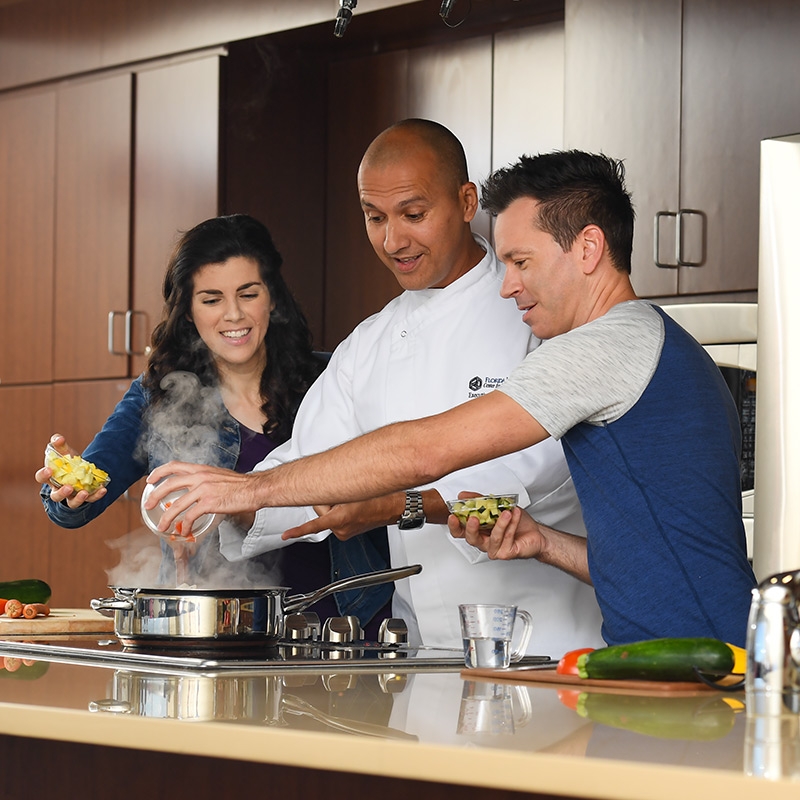 Local chef teaches couple how to take charge of their diabetes in a kitchen
