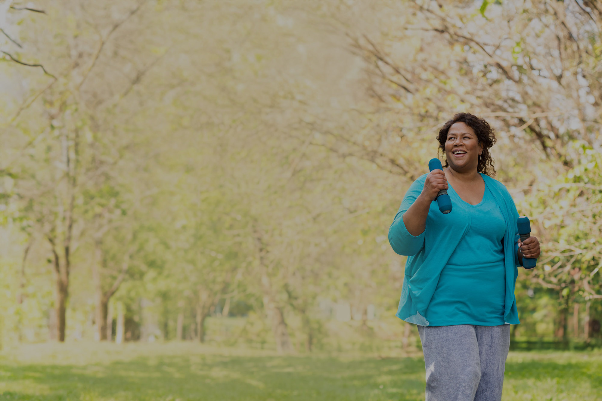 A woman exercising outdoors.