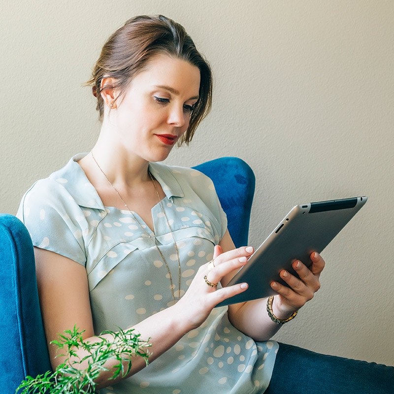 Woman on an iPad requests an appointment to speak with a PCOS specialist at Florida Hospital Diabetes Institute